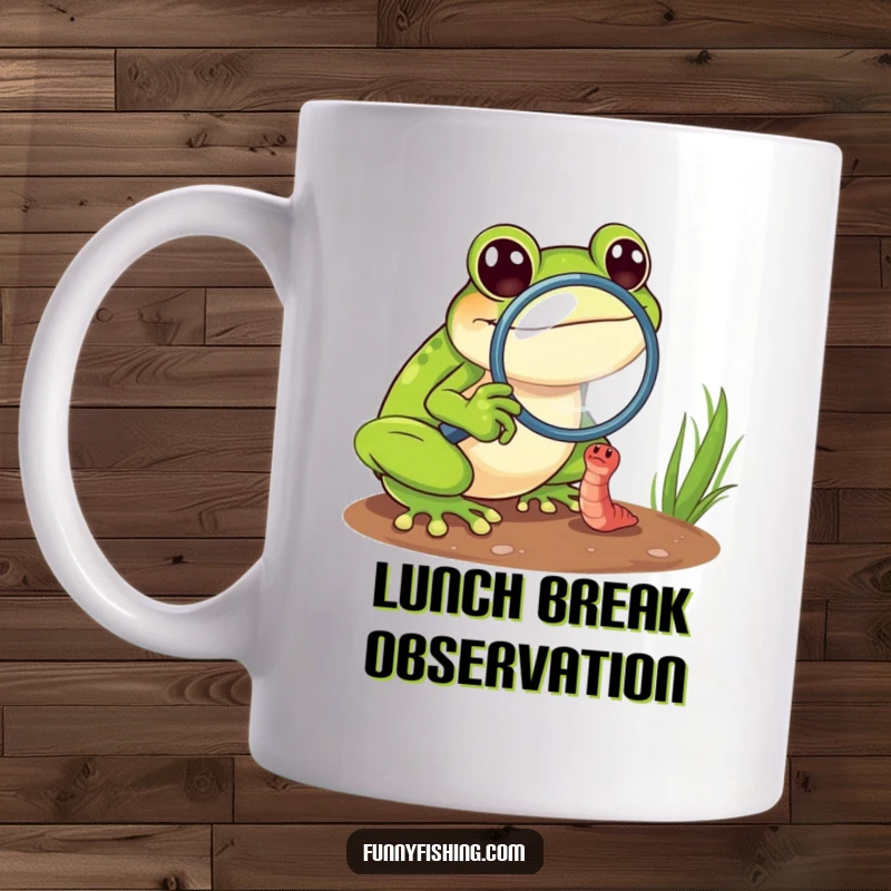Funny frog mug with a magnifying glass zooming in on a tiny, struggling worm, showcasing intense focus and humor.